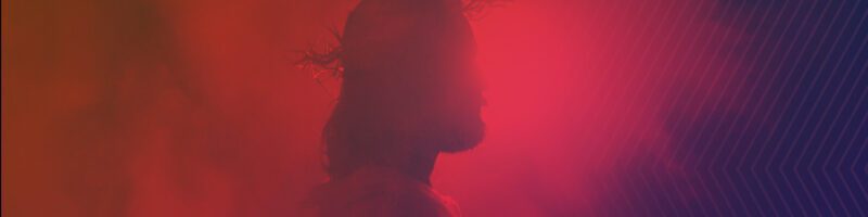 passion week photo of jesus christ with a crown of thorns on a pink background